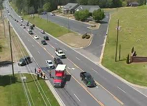 Emergency responders assist traffic after a fire