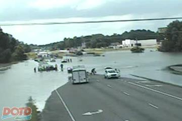 Flooded road blocks traffic in both directions